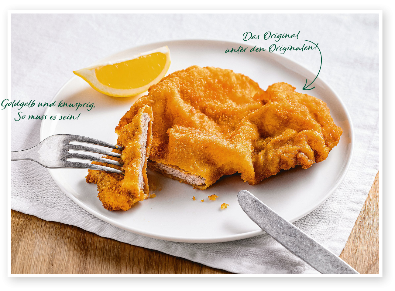 Das originale Figlmüller Wiener Schnitzel - serviert mit Zitrone.